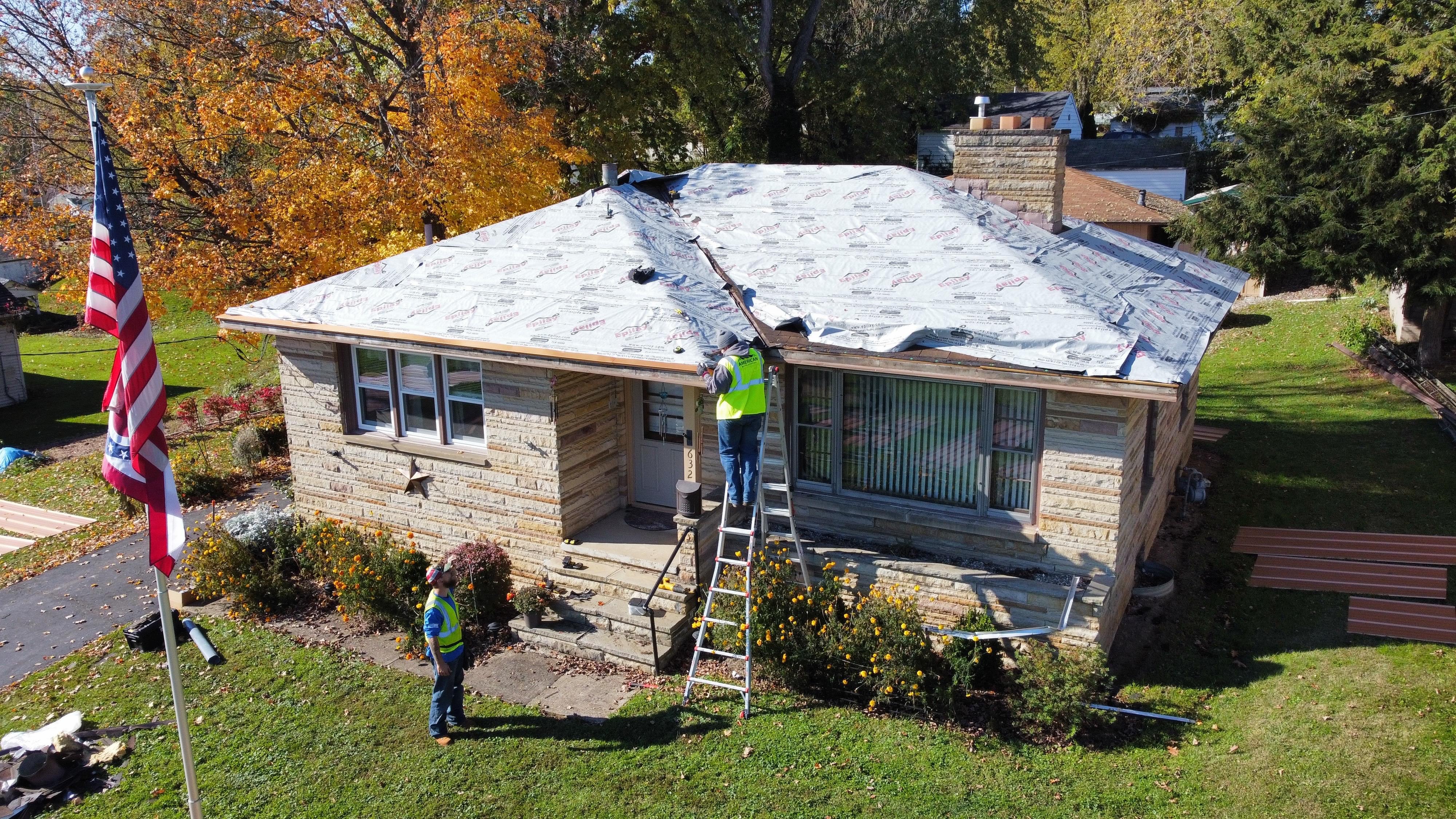 American Metal Roofing repairing a roof 