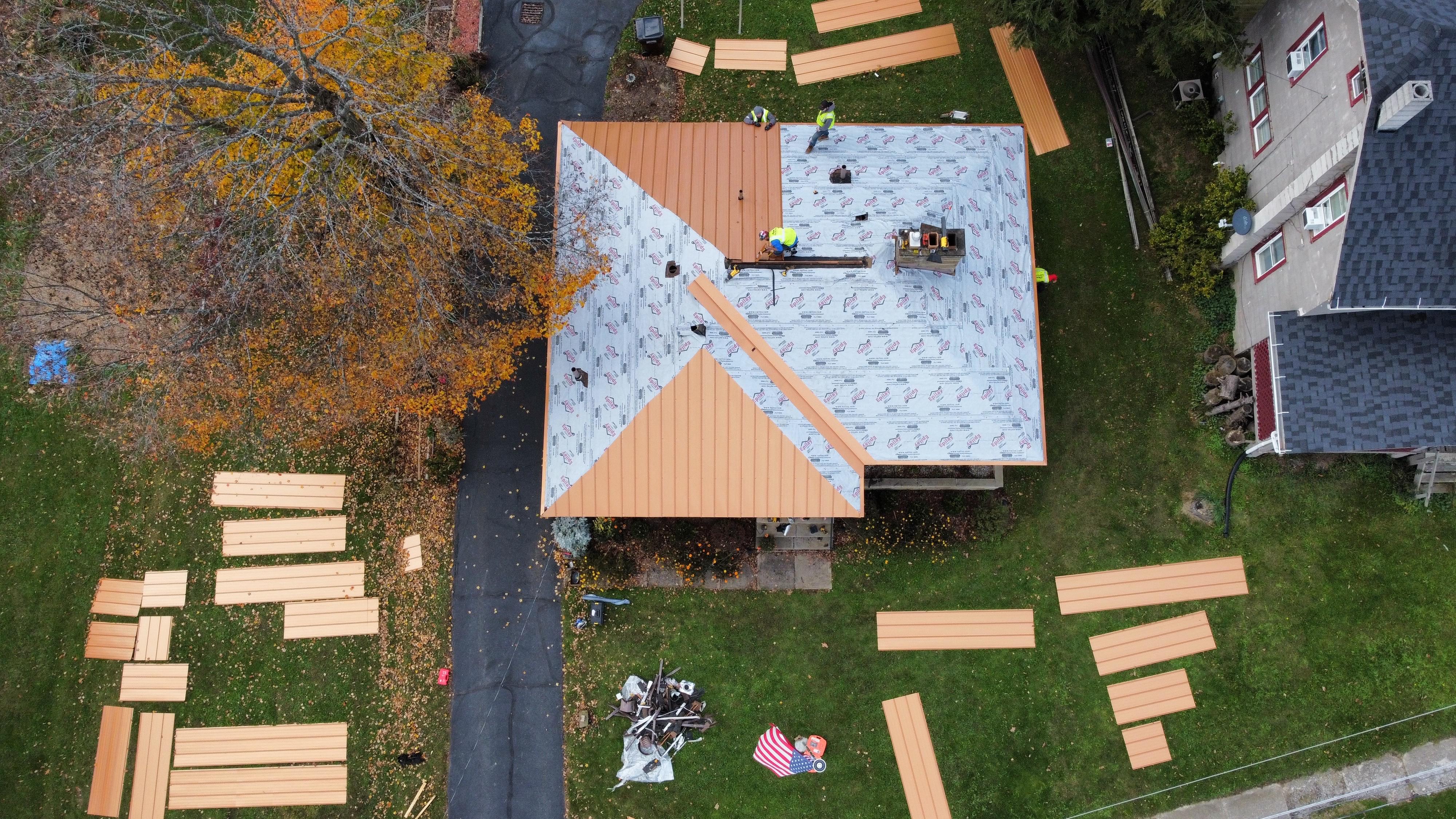 American Metal Roofing repairing a roof